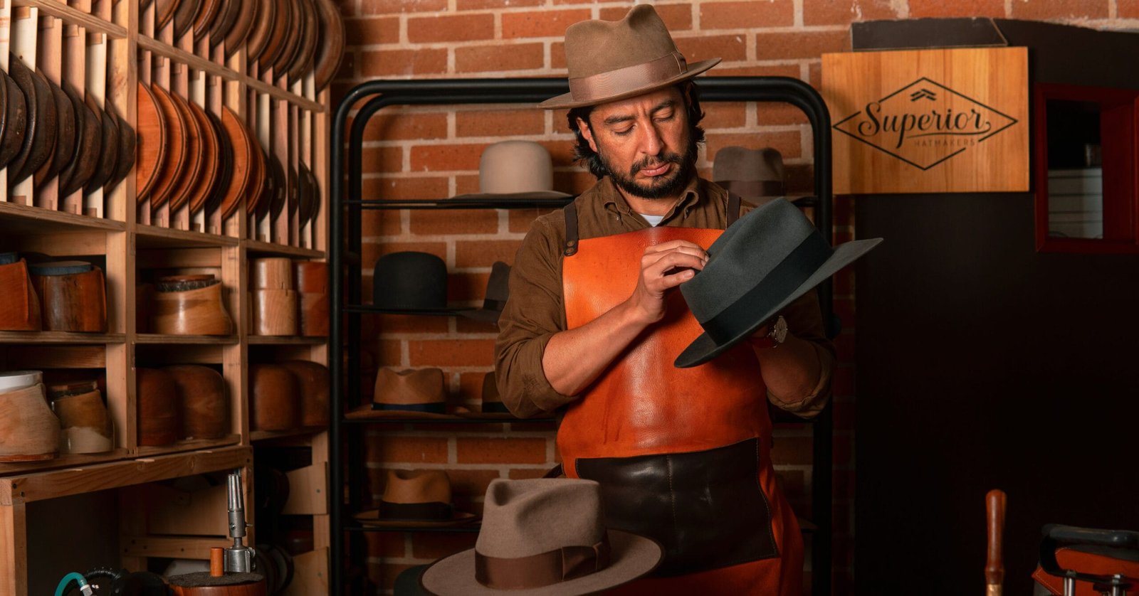 Brushing a felt hat